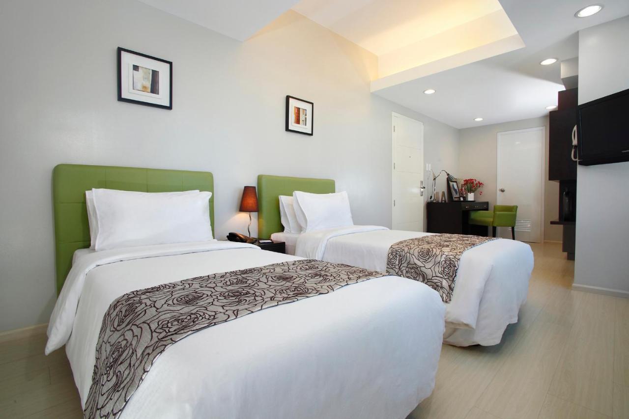 The Exchange Regency Residence Hotel Managed By Hii Pasig City Esterno foto
