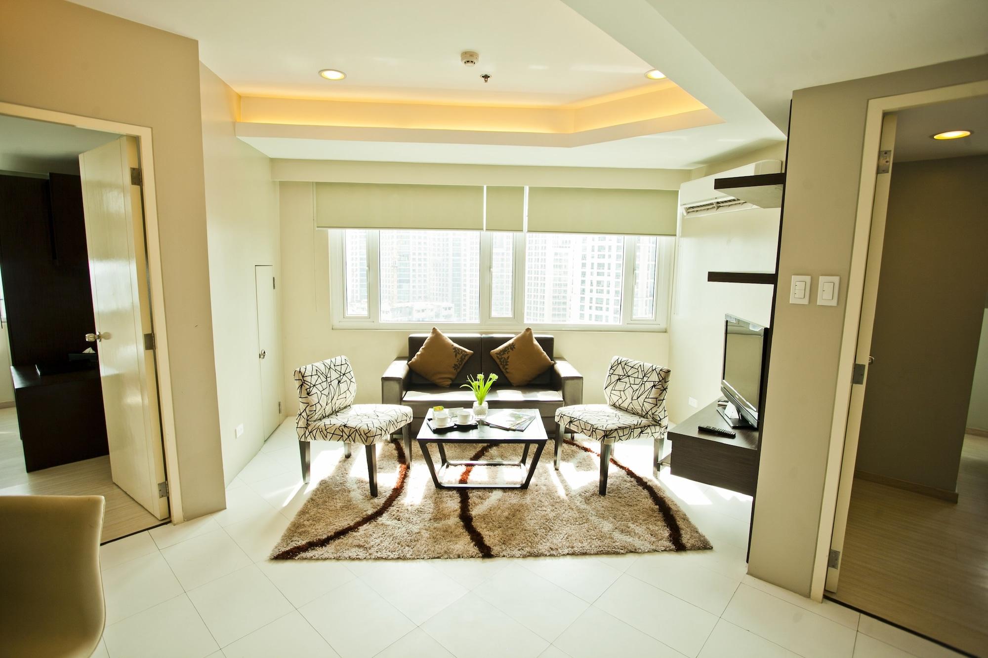 The Exchange Regency Residence Hotel Managed By Hii Pasig City Esterno foto