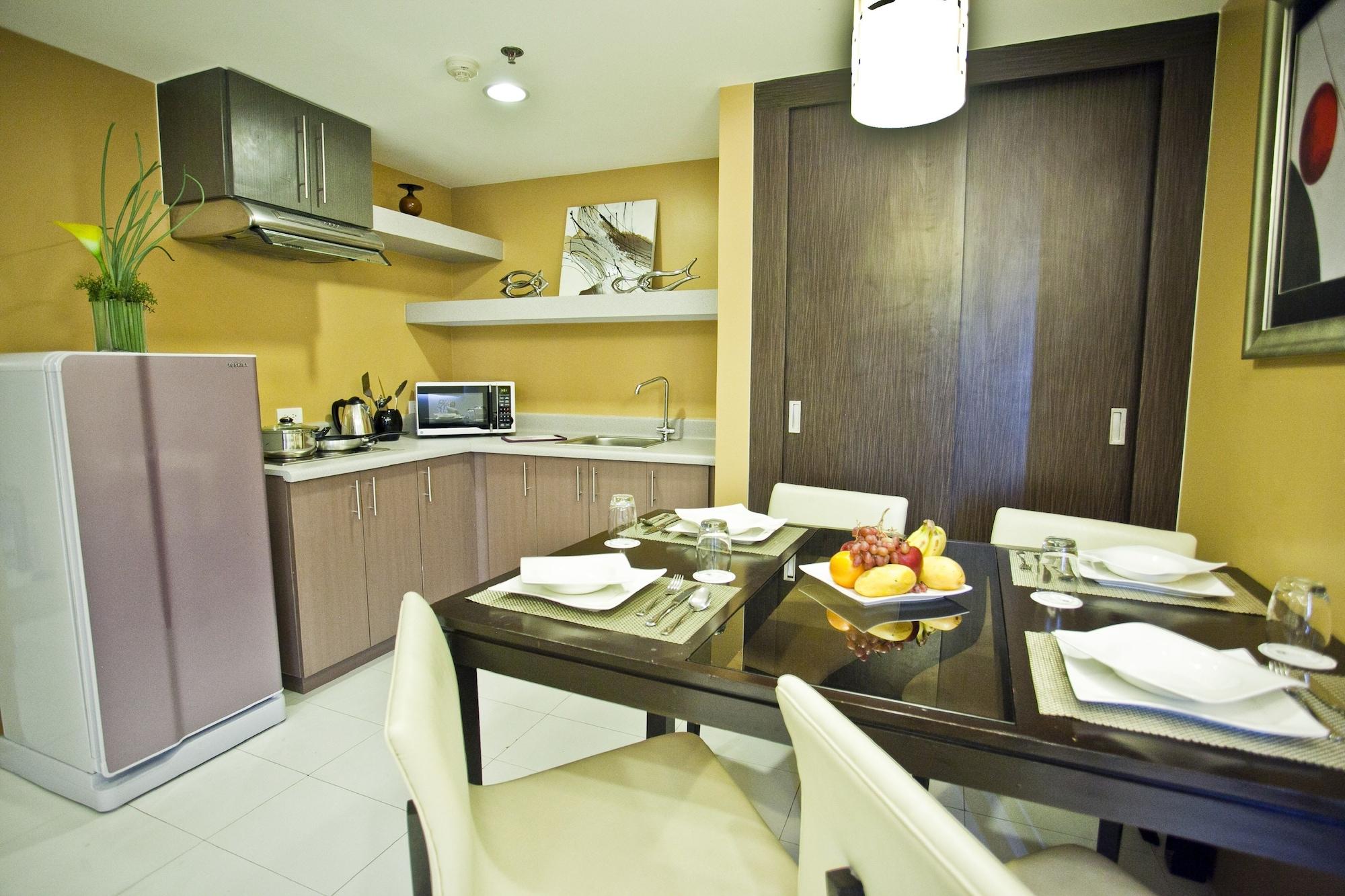 The Exchange Regency Residence Hotel Managed By Hii Pasig City Esterno foto