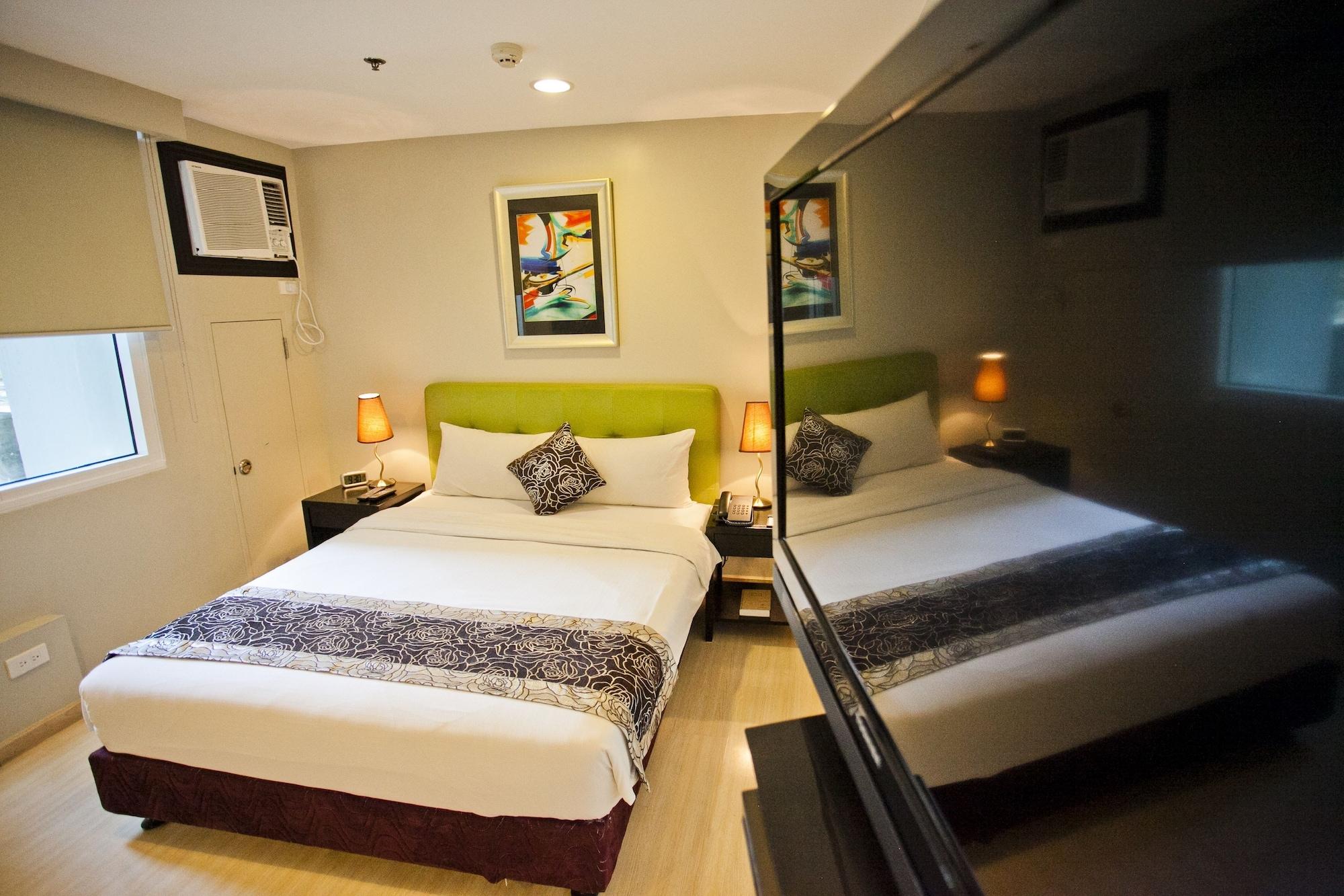 The Exchange Regency Residence Hotel Managed By Hii Pasig City Esterno foto