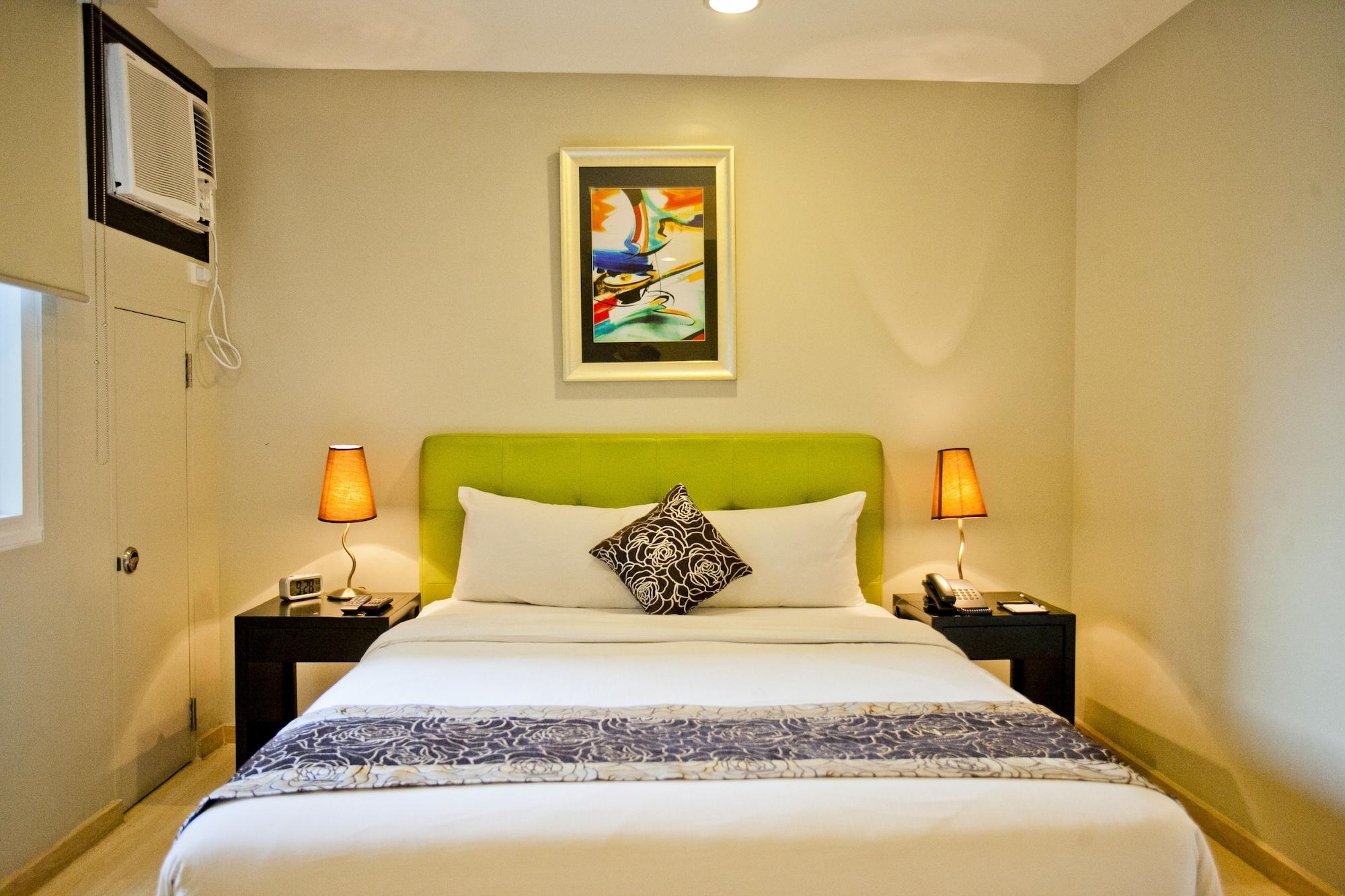 The Exchange Regency Residence Hotel Managed By Hii Pasig City Esterno foto