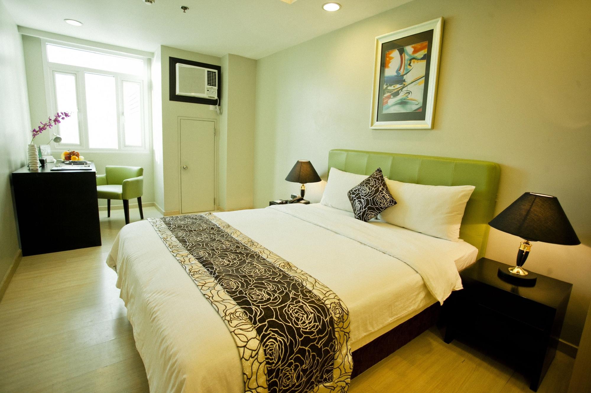 The Exchange Regency Residence Hotel Managed By Hii Pasig City Esterno foto