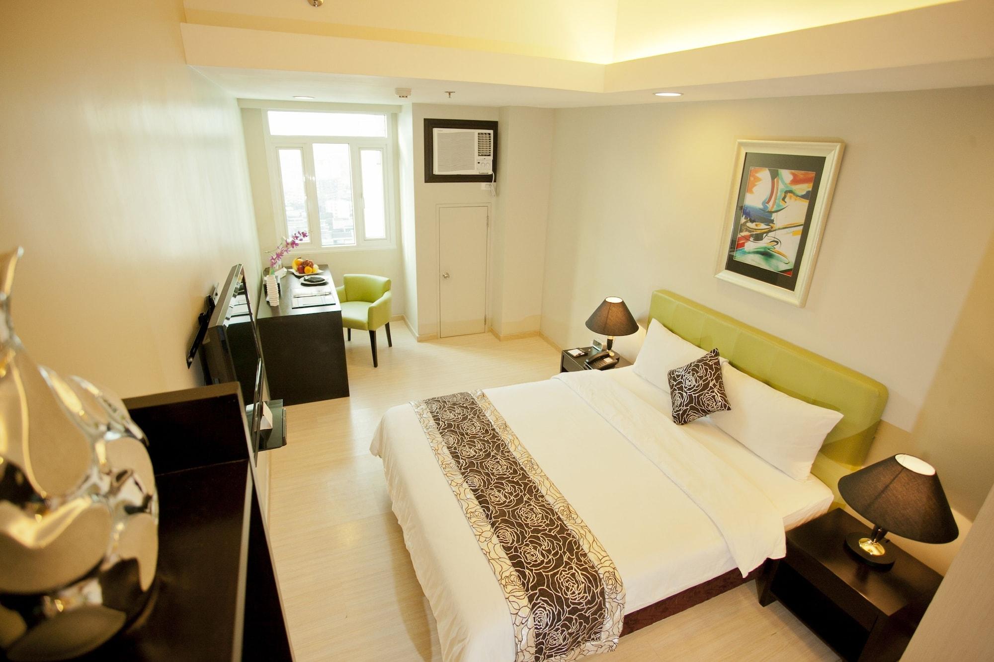 The Exchange Regency Residence Hotel Managed By Hii Pasig City Esterno foto