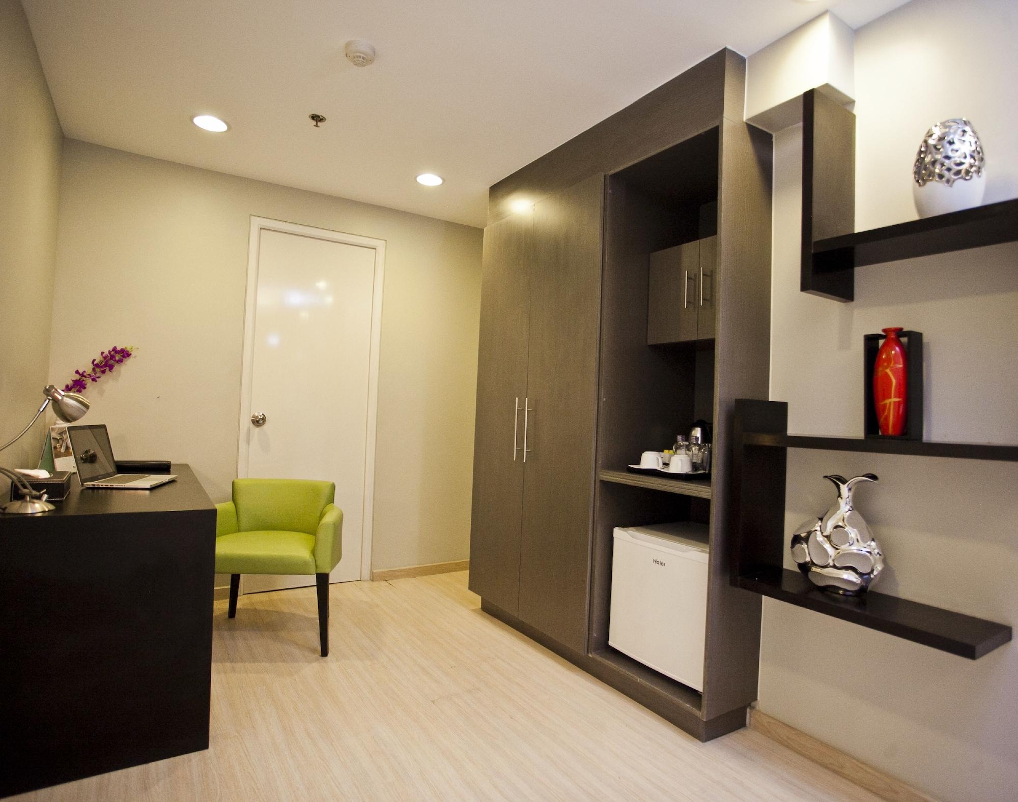 The Exchange Regency Residence Hotel Managed By Hii Pasig City Esterno foto