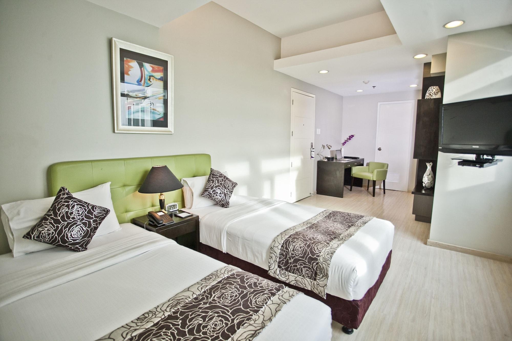 The Exchange Regency Residence Hotel Managed By Hii Pasig City Esterno foto