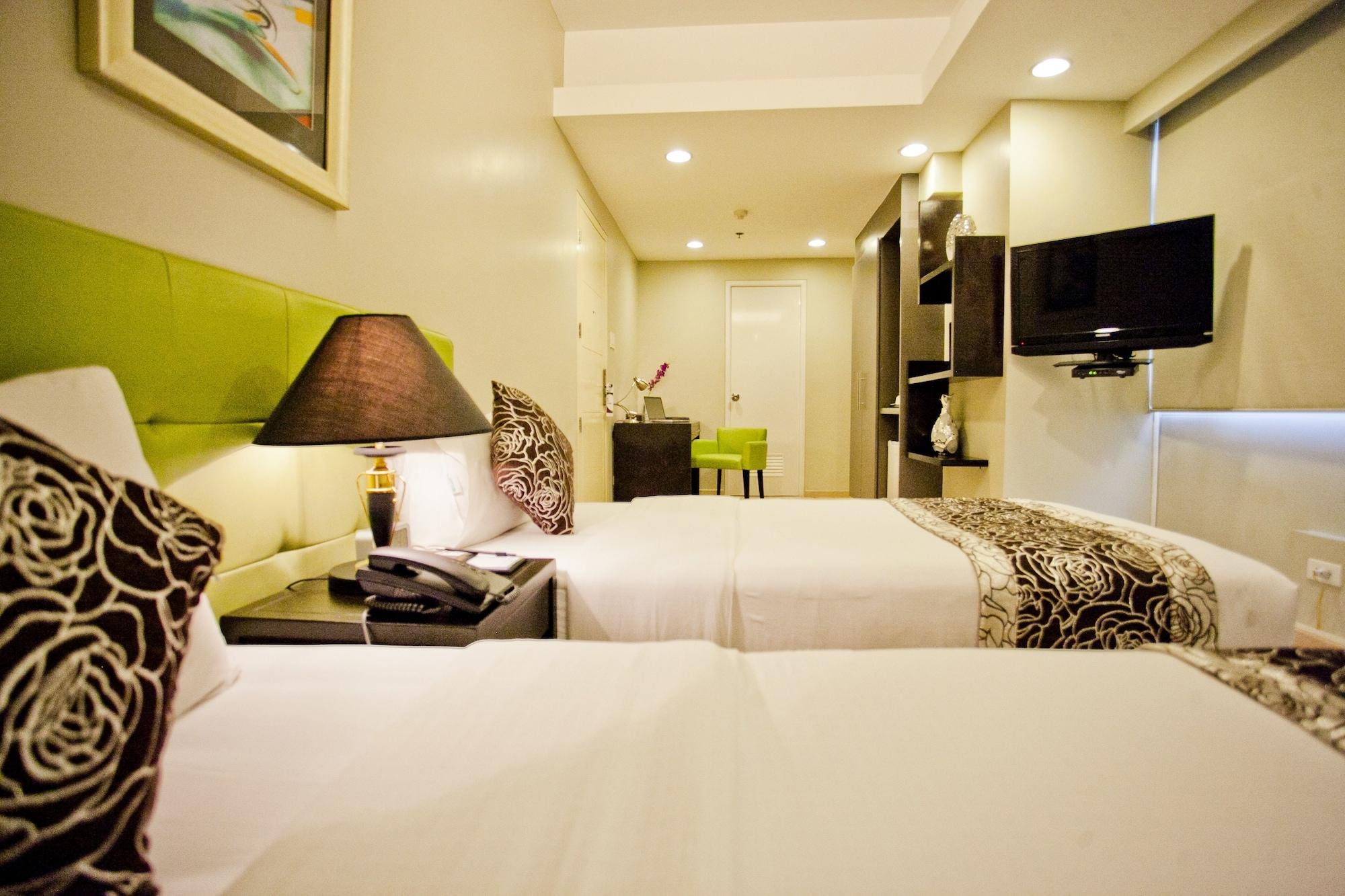 The Exchange Regency Residence Hotel Managed By Hii Pasig City Esterno foto