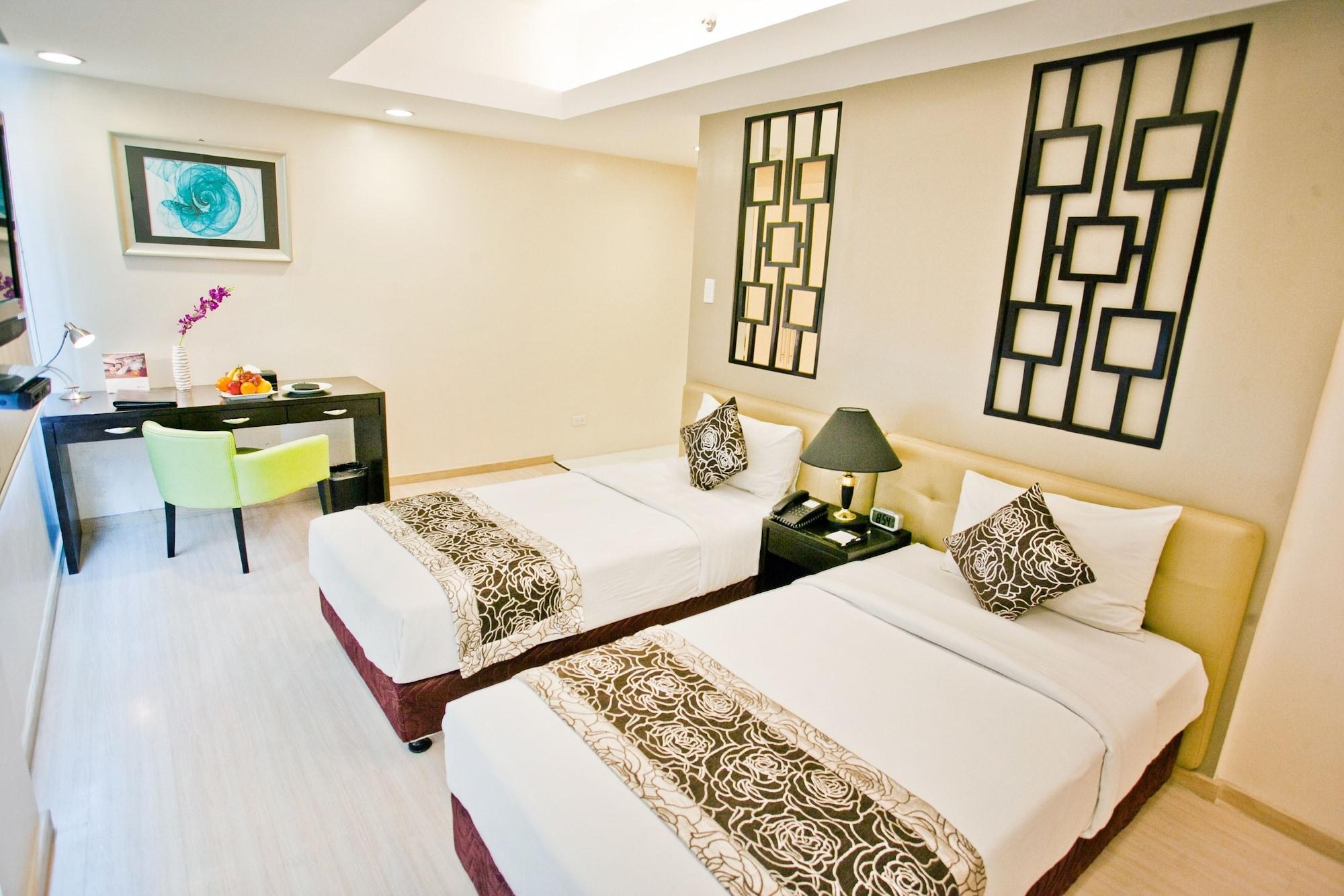 The Exchange Regency Residence Hotel Managed By Hii Pasig City Esterno foto