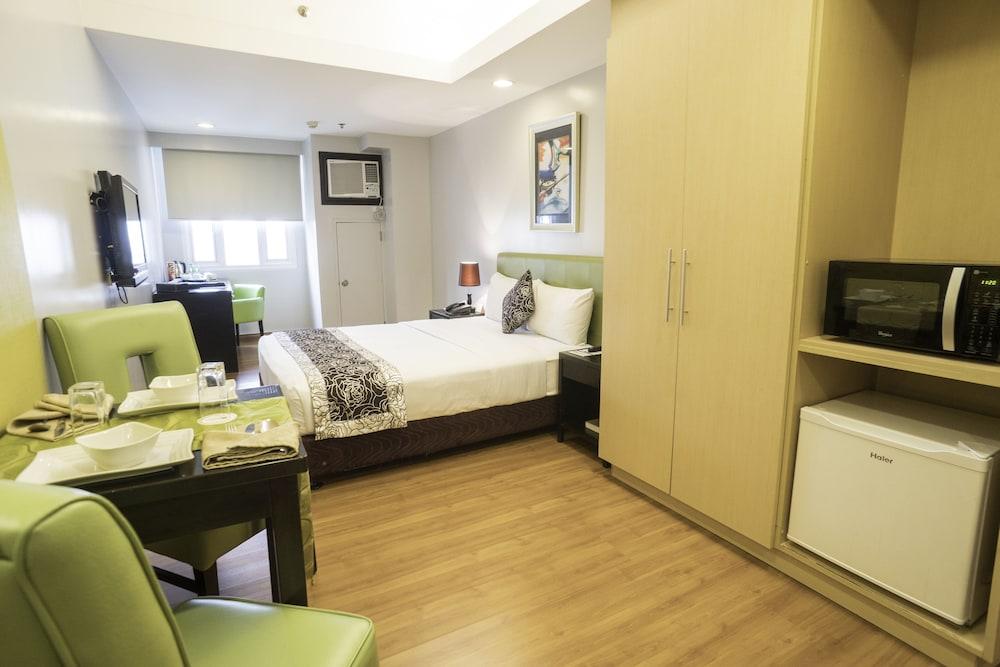 The Exchange Regency Residence Hotel Managed By Hii Pasig City Esterno foto