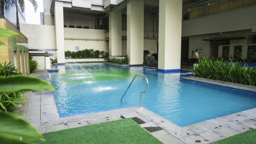 The Exchange Regency Residence Hotel Managed By Hii Pasig City Esterno foto
