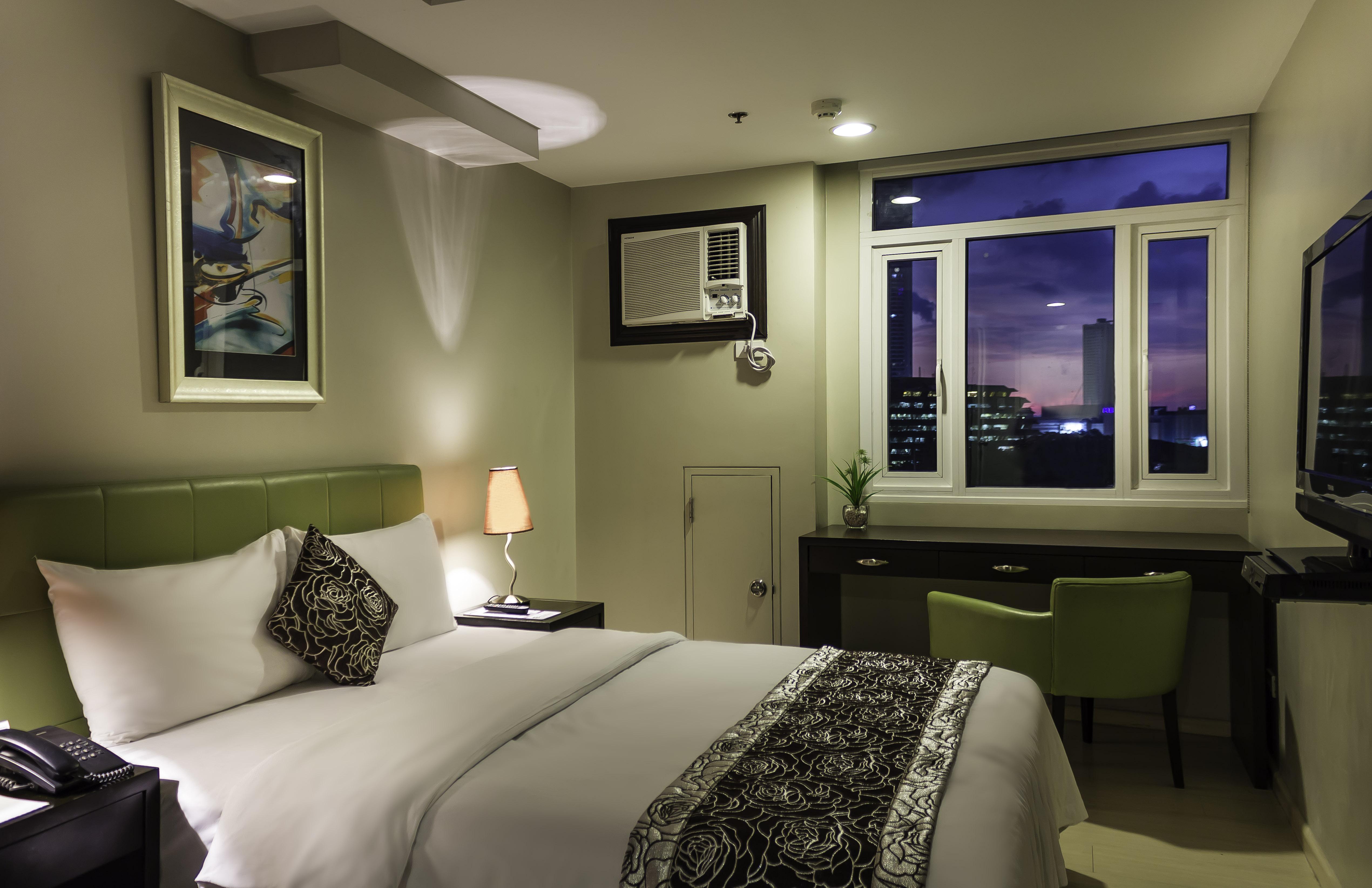 The Exchange Regency Residence Hotel Managed By Hii Pasig City Esterno foto