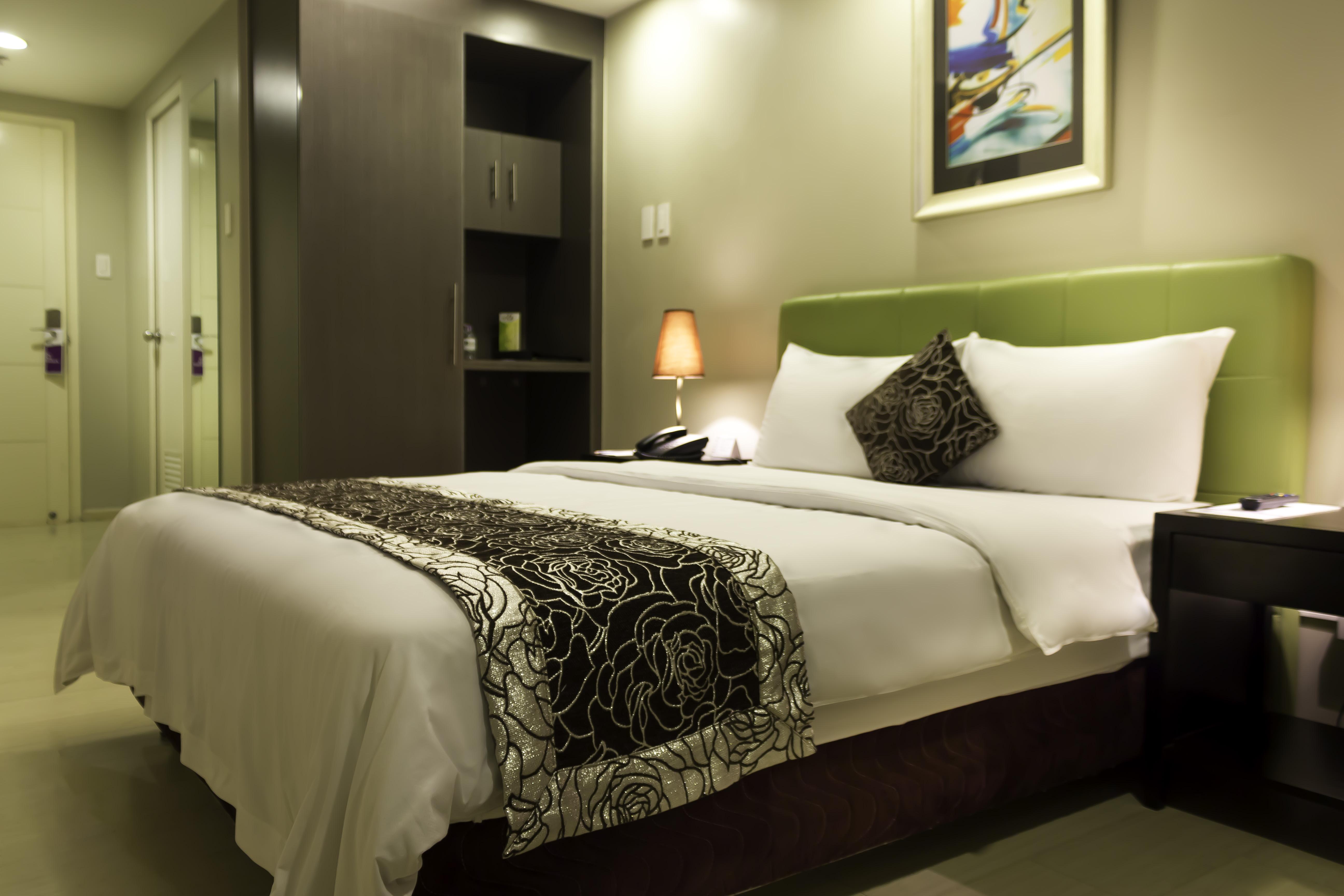 The Exchange Regency Residence Hotel Managed By Hii Pasig City Esterno foto