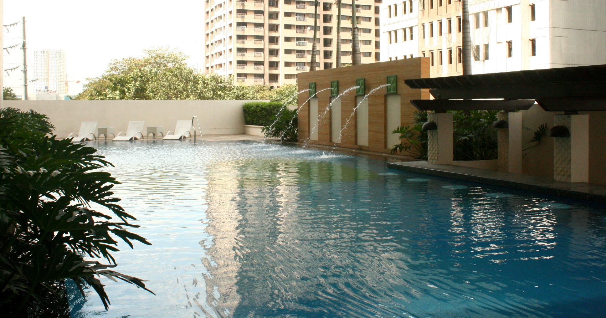 The Exchange Regency Residence Hotel Managed By Hii Pasig City Esterno foto