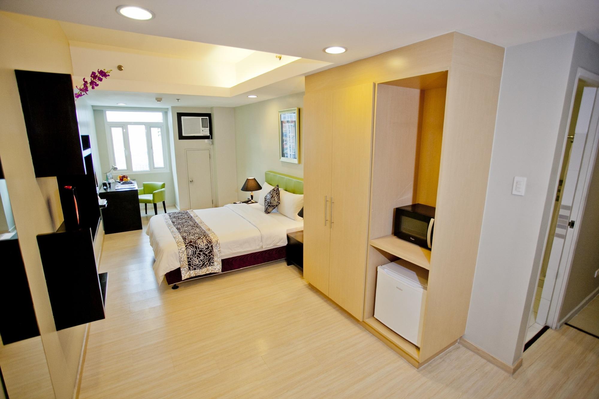 The Exchange Regency Residence Hotel Managed By Hii Pasig City Esterno foto