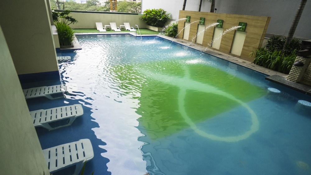 The Exchange Regency Residence Hotel Managed By Hii Pasig City Esterno foto