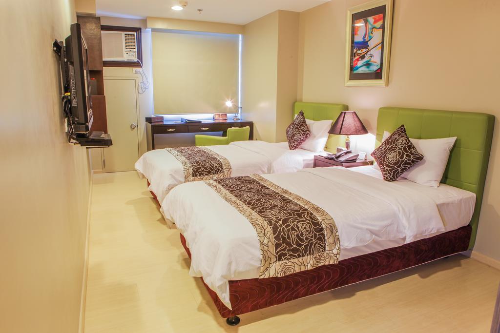 The Exchange Regency Residence Hotel Managed By Hii Pasig City Esterno foto