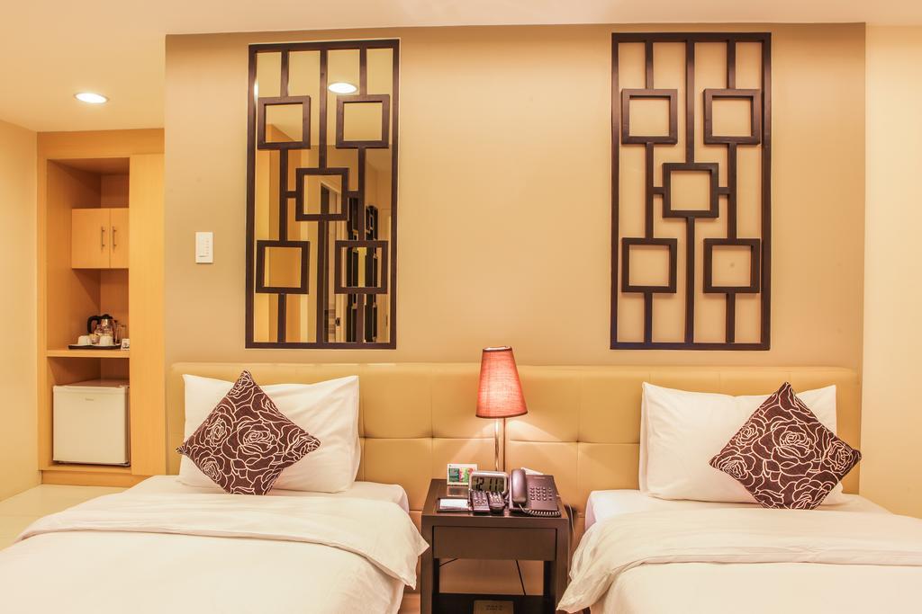 The Exchange Regency Residence Hotel Managed By Hii Pasig City Esterno foto