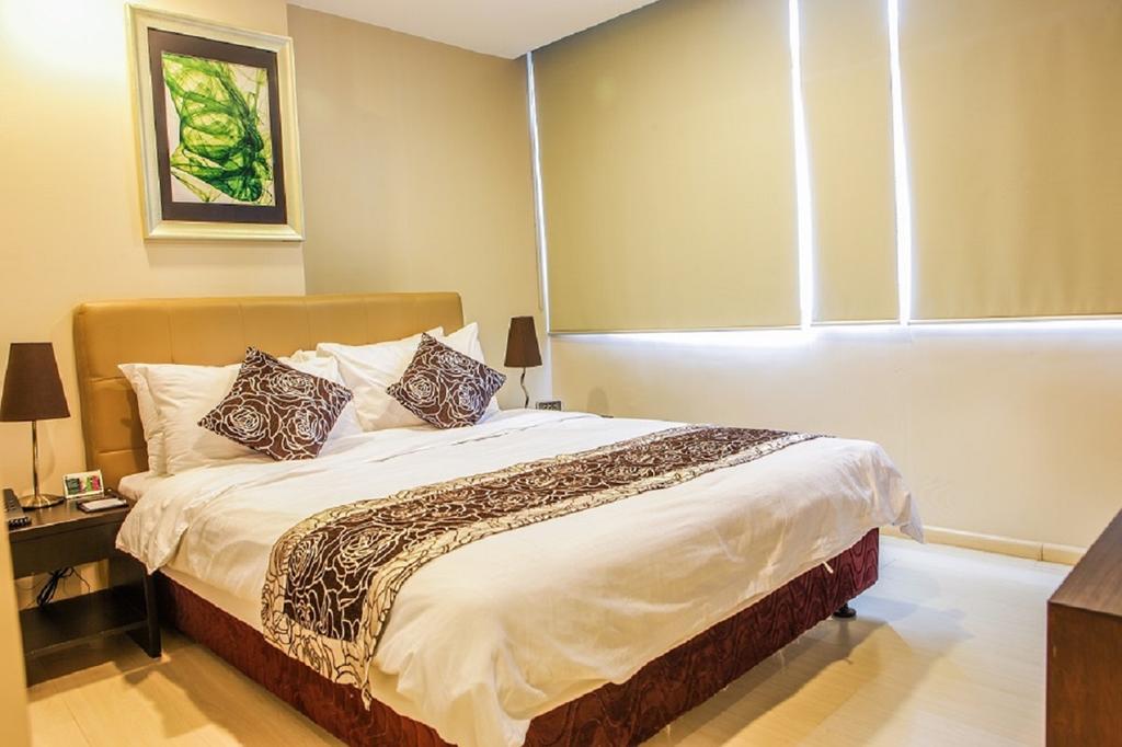 The Exchange Regency Residence Hotel Managed By Hii Pasig City Esterno foto