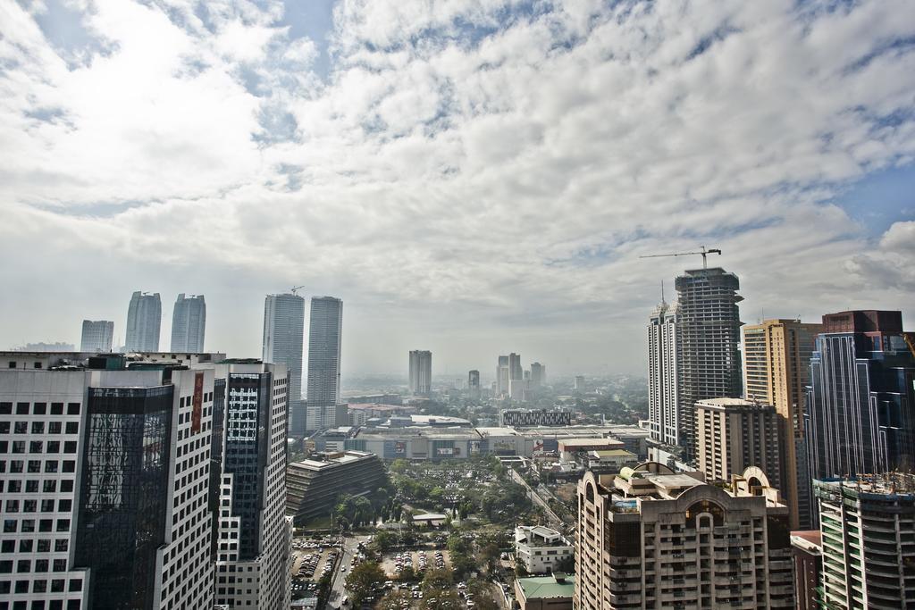 The Exchange Regency Residence Hotel Managed By Hii Pasig City Esterno foto