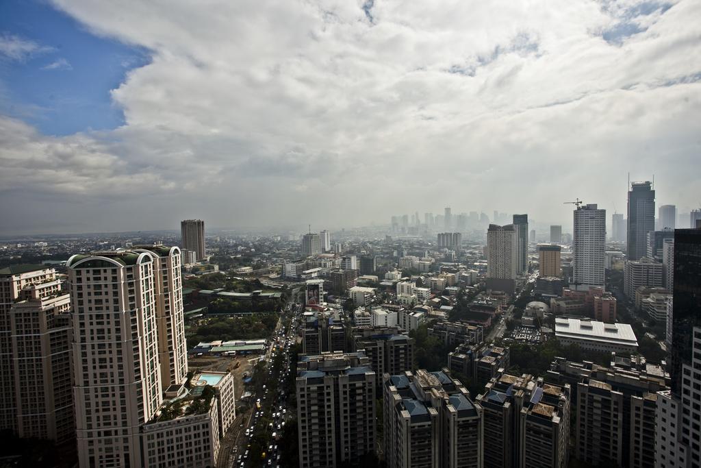 The Exchange Regency Residence Hotel Managed By Hii Pasig City Esterno foto