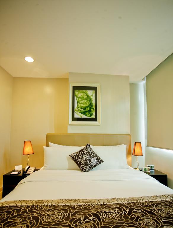 The Exchange Regency Residence Hotel Managed By Hii Pasig City Esterno foto