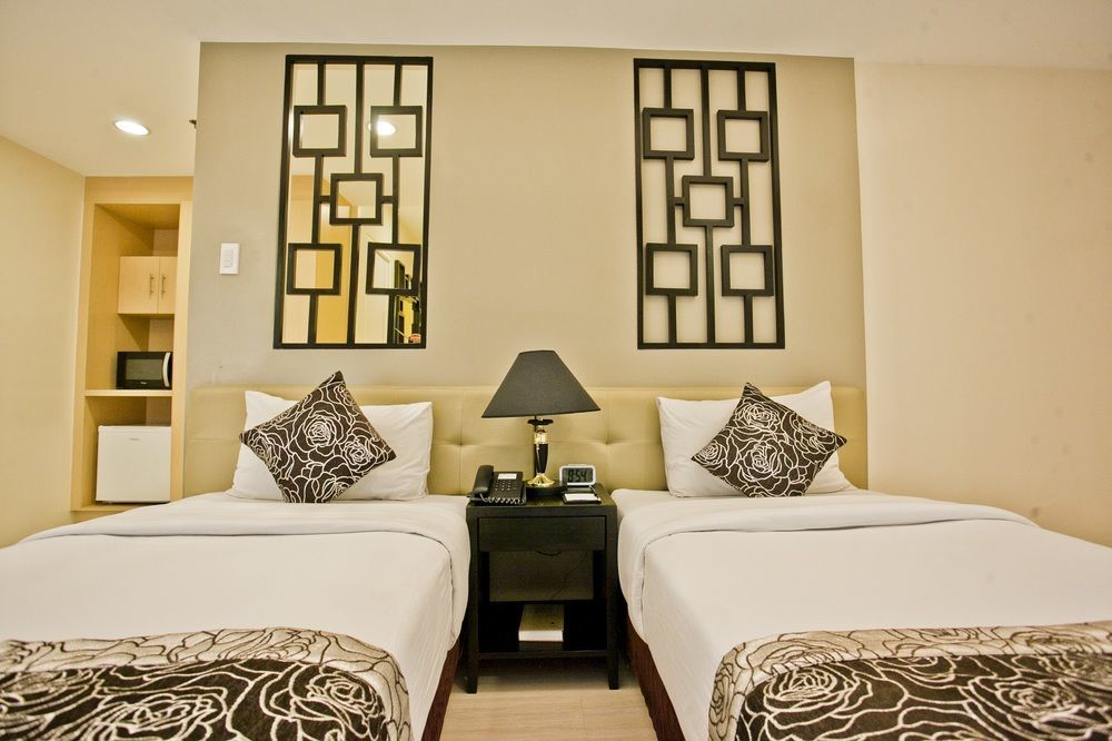 The Exchange Regency Residence Hotel Managed By Hii Pasig City Esterno foto